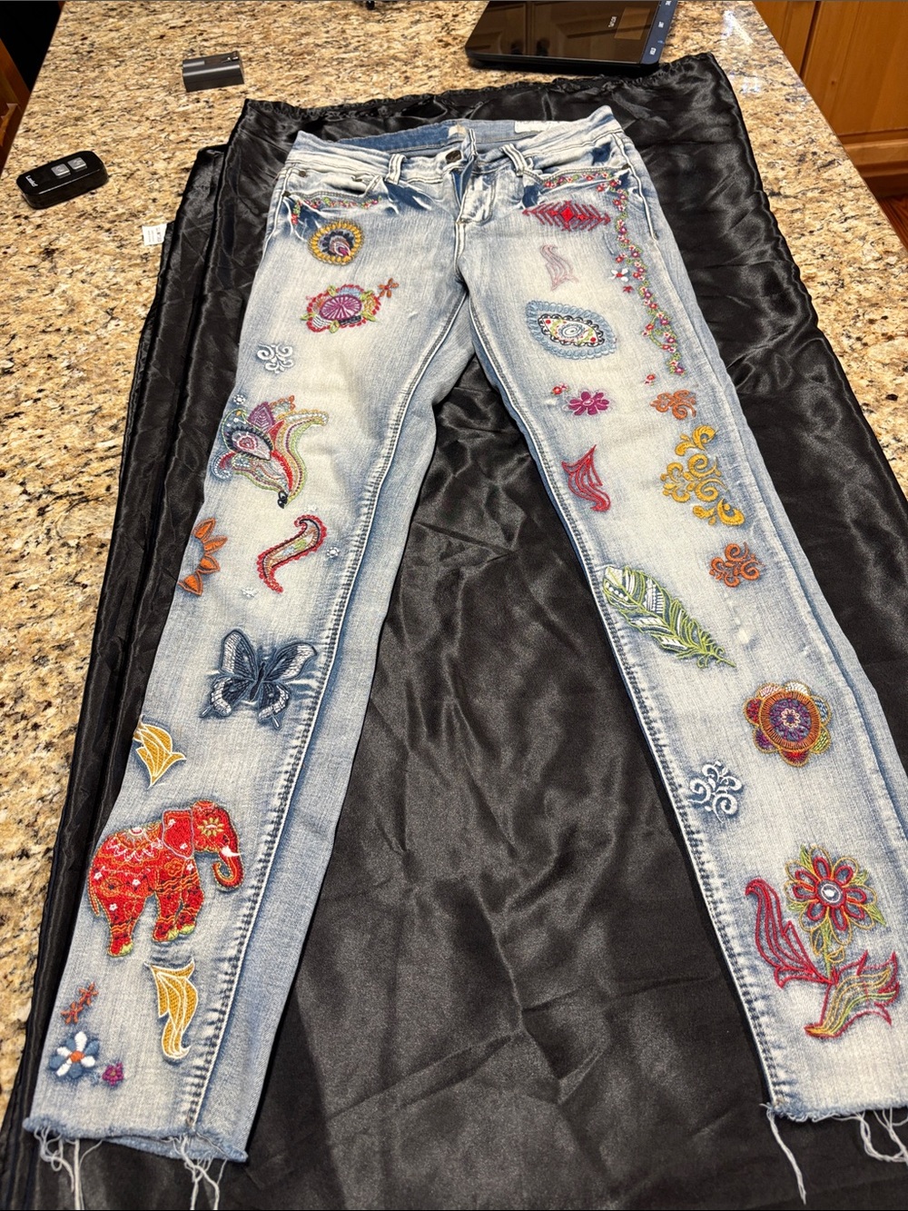 Women’s Embroidered Light Blue Jeans with Colorful Appliqué
